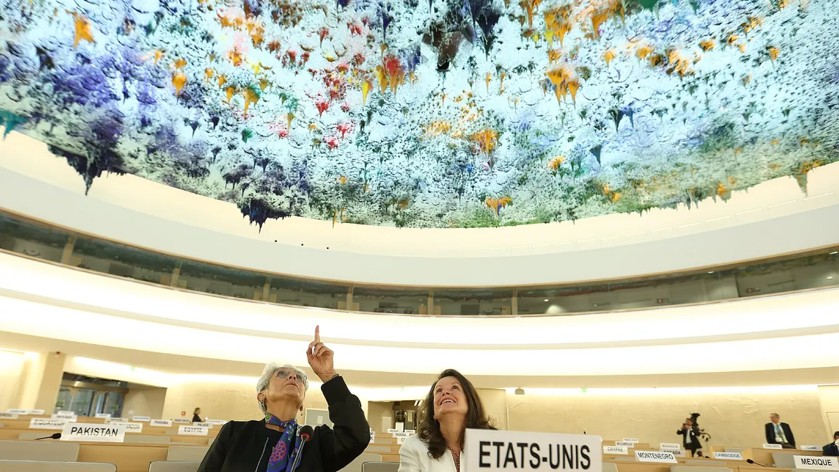 Symbolic image: the U.N. Human Rights Council chamber in Geneva with its colorful ceiling sculpture