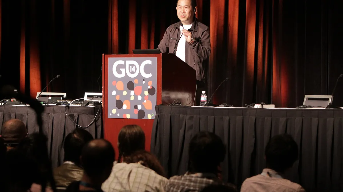 Archive image: Shenmue creator Yu Suzuki giving a talk at the 2014 Game Developers Conference